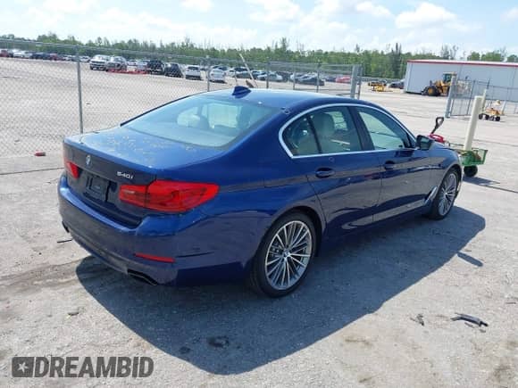 2019 BMW 5 Series 540i with VIN WBAJE5C51KBM76742, listed as a IAAI auction lot 42656465 with 54,600 mi miles and . Bid and sale history available at DreamBid. Image 4.