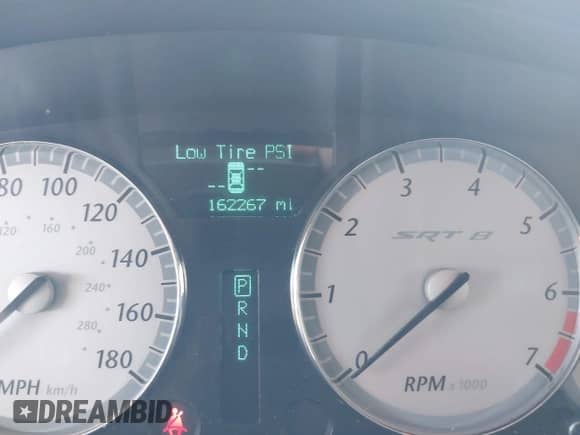 2006 Chrysler 300 C SRT-8 with VIN 2C3KA73WX6H377782, listed as a IAAI auction lot 42701559 with 162,267 mi miles and . Bid and sale history available at DreamBid. Image 7.