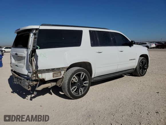 2019 Chevrolet Suburban Premier с VIN 1GNSKJKJ1KR166497, выставлен на аукционе Copart как лот 87331014 с пробегом 162 269 миль миль и Списание • Salvage title. История ставок и продаж доступна на DreamBid. Изображение 3.