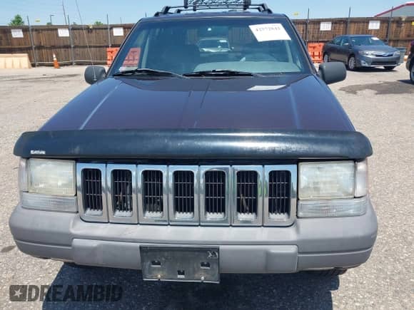 1996 Jeep Grand Cherokee Laredo z VIN 1J4GZ58Y2TC354076, wystawiony jako IAAI lot #42572842 z przebiegiem 172 282 mil mil oraz . Historia ofert i sprzedaży dostępna na DreamBid. Obrazek 6.