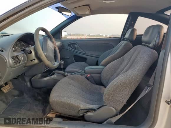 2000 Chevrolet Cavalier with VIN 1G1JC1243Y7363101, listed as a Copart auction lot 57591485 with 252,742 mi miles and Salvage title. Bid and sale history available at DreamBid. Image 7.