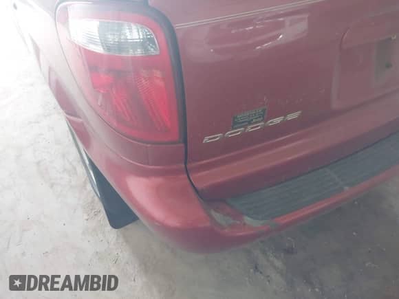 2004 Dodge Caravan SXT with VIN 1D4GP45R34B548595, listed as a IAAI auction lot 42561587 with 132,858 mi miles and . Bid and sale history available at DreamBid. Image 6.
