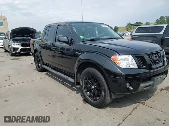 2021 Nissan Frontier SV with VIN 1N6ED0EB0MN711059, listed as a Copart auction lot 64469215 with 36,877 mi miles and Salvage title. Bid and sale history available at DreamBid. Image 14.