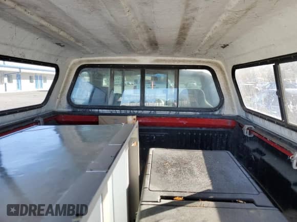 1998 Dodge 1500 z VIN 1B7HF16Z1WS579672, wystawiony jako Copart lot #78048884 z przebiegiem 245 309 mil mil oraz Czysty tytuł • Clean title. Historia ofert i sprzedaży dostępna na DreamBid. Obrazek 10.