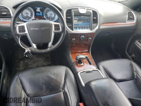 2012 Chrysler 300 Limited с VIN 2C3CCACG9CH283506, выставлен на аукционе Copart как лот 70453315 с пробегом 182 382 миль миль и Списание • Salvage title. История ставок и продаж доступна на DreamBid. Изображение 8.