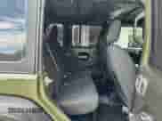 2022 Jeep Wrangler Unlimited Willys z VIN 1C4HJXDN6NW195685, wystawiony jako Copart lot #87094405 z przebiegiem 142 158 mil mil oraz Czysty tytuł • Clean title. Historia ofert i sprzedaży dostępna na DreamBid. Obrazek 6.