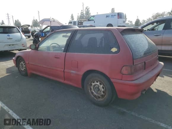 1990 Honda Civic with VIN 2HGED6341LH559585, listed as a Copart auction lot 76074684 with 199,879 mi miles and Salvage title. Bid and sale history available at DreamBid. Image 2.