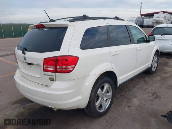 2009 Dodge Journey SXT with VIN 3D4GH57V49T554862, listed as a IAAI auction lot 43257196 with 166,124 mi miles and . Bid and sale history available at DreamBid. Image 4.