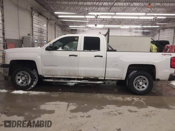 2014 Chevrolet Silverado 1500 Work Truck z VIN 1GCVKPEH7EZ230726, wystawiony jako IAAI lot #41249528 z przebiegiem 184 868 mil mil oraz . Historia ofert i sprzedaży dostępna na DreamBid. Obrazek 14.