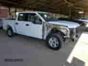 2020 Ford F-150 XL with VIN 1FTEW1C45LKD11814, listed as a Copart auction lot 69002595 with 106,500 mi miles and Salvage title. Bid and sale history available at DreamBid. Image 4.