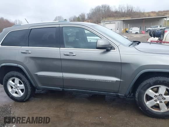 2012 Jeep Grand Cherokee Laredo с VIN 1C4RJFAGXCC118823, выставлен на аукционе IAAI как лот 41808398 с пробегом 153 509 миль миль и . История ставок и продаж доступна на DreamBid. Изображение 13.