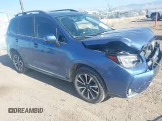 2017 Subaru Forester Touring z VIN JF2SJGWC9HH590231, wystawiony jako IAAI lot #43221251 z przebiegiem 110 560 mil mil oraz . Historia ofert i sprzedaży dostępna na DreamBid. Obrazek 1.