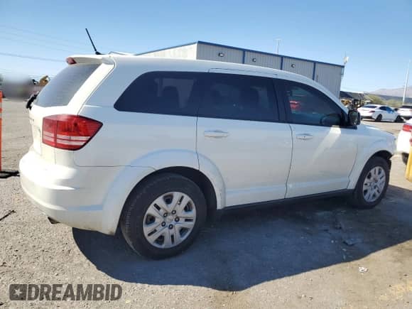 2015 Dodge Journey SE with VIN 3C4PDCAB2FT516876, listed as a Copart auction lot 84073205 with 154,462 mi miles and Salvage title. Bid and sale history available at DreamBid. Image 3.