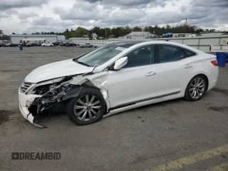 2014 Hyundai Azera Limited с VIN KMHFH4JG0EA357388, выставлен на аукционе Copart как лот 82293895 с пробегом 163 665 миль миль и Списание • Salvage title. История ставок и продаж доступна на DreamBid. Изображение 1.