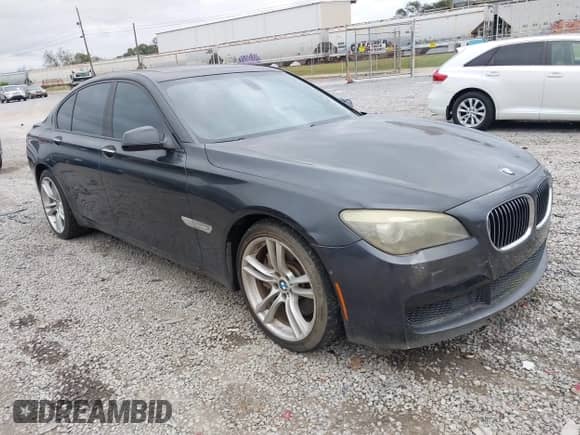 2011 BMW 7 Series 750i with VIN WBAKA8C51BCY36927, listed as a IAAI auction lot 43394678 with 123,804 mi miles and . Bid and sale history available at DreamBid. Image 1.