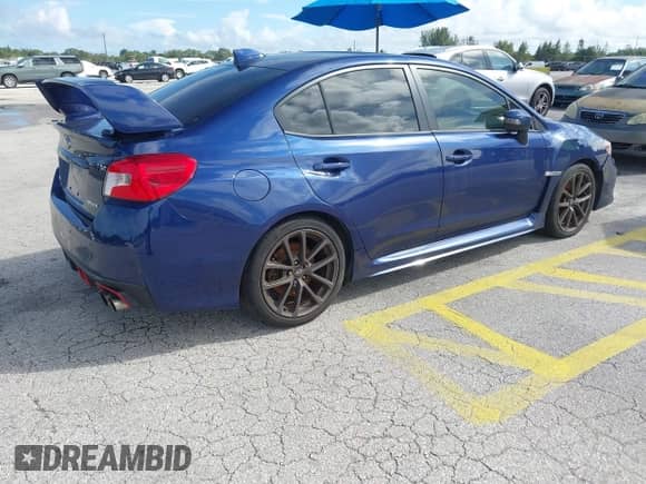 2019 Subaru WRX Limited with VIN JF1VA1P65K8815775, listed as a IAAI auction lot 43289927 with 130,856 mi miles and . Bid and sale history available at DreamBid. Image 4.