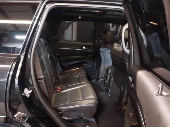 2021 Jeep Grand Cherokee Limited with VIN 1C4RJFBG3MC562643, listed as a IAAI auction lot 41829277 with 69,314 mi miles and . Bid and sale history available at DreamBid. Image 8.