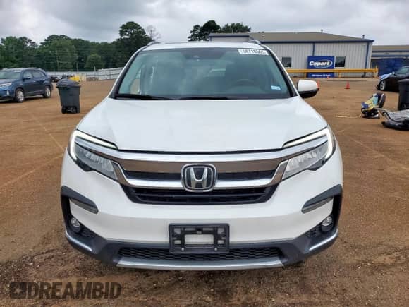 2022 Honda Pilot Touring 7-Passenger with VIN 5FNYF5H67NB013506, listed as a Copart auction lot 58718565 with 47,072 mi miles and Salvage title. Bid and sale history available at DreamBid. Image 5.