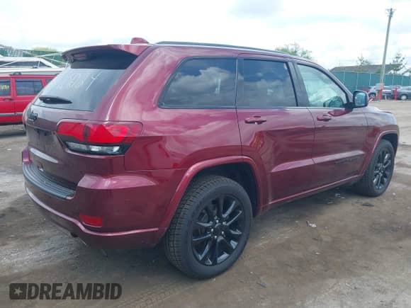 2020 Jeep Grand Cherokee Laredo E with VIN 1C4RJFAG0LC210474, listed as a IAAI auction lot 42266074 with 59,699 mi miles and . Bid and sale history available at DreamBid. Image 4.