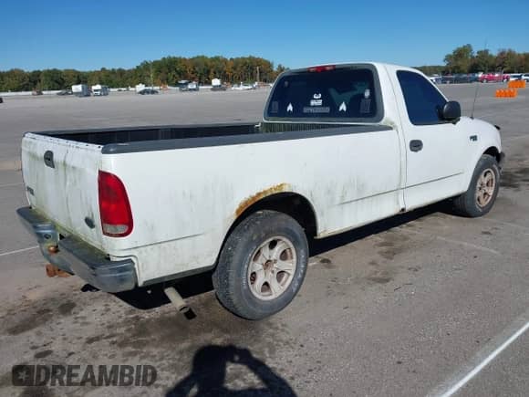 2002 Ford F-150 XL с VIN 1FTRF17212NA27698, выставлен на аукционе IAAI как лот 43449350 с пробегом 290 416 миль миль и . История ставок и продаж доступна на DreamBid. Изображение 4.