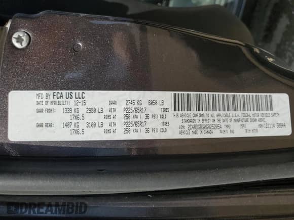 2016 Dodge Grand Caravan American Value with VIN 2C4RDGBG0GR252054, listed as a Copart auction lot 71838825 with 128,684 mi miles and Salvage title. Bid and sale history available at DreamBid. Image 13.