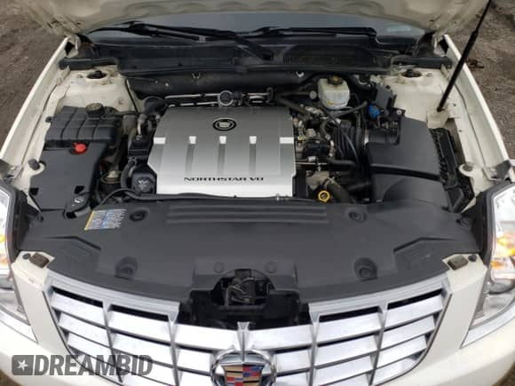 2006 Cadillac DTS Professional z VIN 1GEEH06Y56U500692, wystawiony jako Copart lot #56546565 z przebiegiem 26 810 mil mil oraz Szkoda całkowita • Salvage title. Historia ofert i sprzedaży dostępna na DreamBid. Obrazek 11.