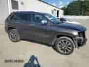 2017 Jeep Grand Cherokee Overland with VIN 1C4RJECGXHC916964, listed as a Copart auction lot 80358275 with 169,868 mi miles and Salvage title. Bid and sale history available at DreamBid. Image 4.