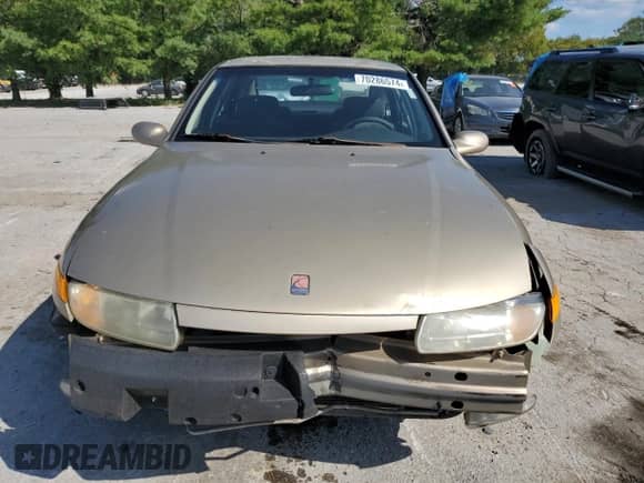 2000 Saturn LS с VIN 1G8JW52R3YY633983, выставлен на аукционе Copart как лот 70286574 с пробегом Не указан миль и Списание • Salvage title. История ставок и продаж доступна на DreamBid. Изображение 5.