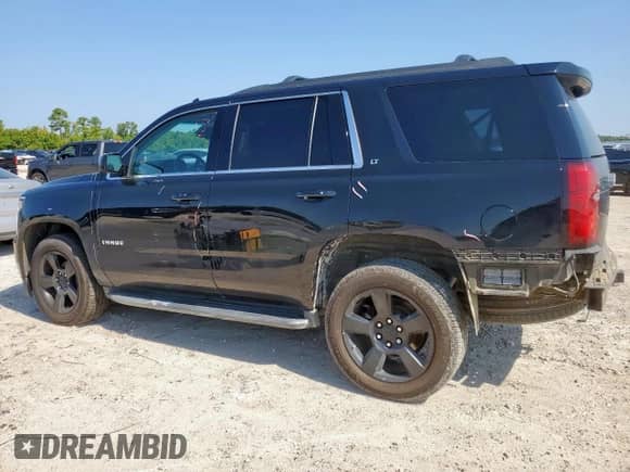 2017 Chevrolet Tahoe LT with VIN 1GNSCBKC5HR376503, listed as a Copart auction lot 68554795 with 157,137 mi miles and Salvage title. Bid and sale history available at DreamBid. Image 2.