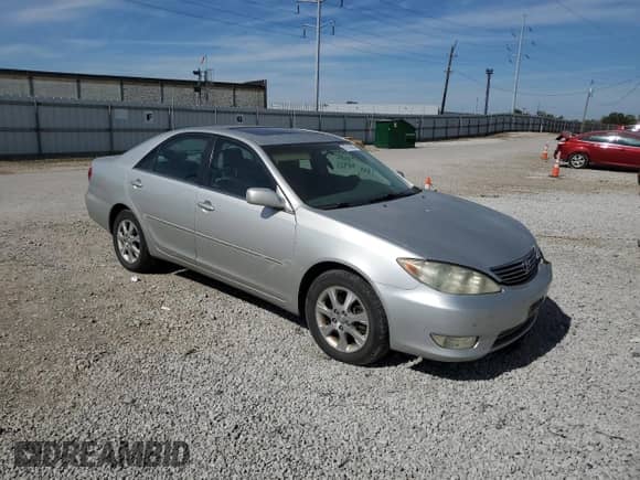 2005 Toyota Camry XLE с VIN 4T1BF30K35U614921, выставлен на аукционе Copart как лот 82188865 с пробегом 180 619 миль миль и Списание • Salvage title. История ставок и продаж доступна на DreamBid. Изображение 4.