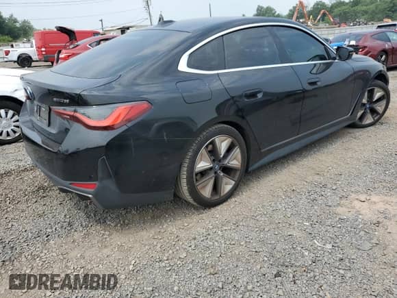 2023 BMW i4 eDrive35 with VIN WBY43AW0XPFP92914, listed as a Copart auction lot 66748865 with 32,088 mi miles and Salvage title. Bid and sale history available at DreamBid. Image 3.