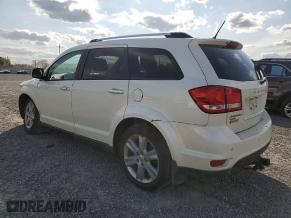 2013 Dodge Journey R/T with VIN 3C4PDDFG8DT615337, listed as a Copart auction lot 71976855 with 211,359 mi miles and Clean title. Bid and sale history available at DreamBid. Image 2.