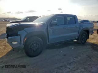 2024 Nissan Frontier Pro-X with VIN 1N6ED1EJ8RN649088, listed as a Copart auction lot 70962715 with 13,541 mi miles and Salvage title. Bid and sale history available at DreamBid. Image 1.