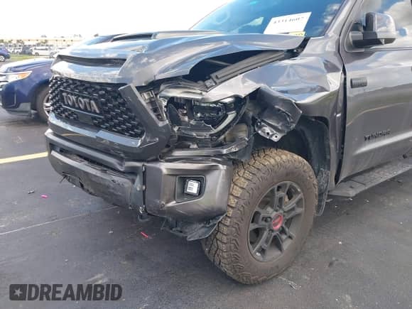 2021 Toyota Tundra SR5 with VIN 5TFDY5F19MX995527, listed as a IAAI auction lot 43314607 with 22,874 mi miles and . Bid and sale history available at DreamBid. Image 6.