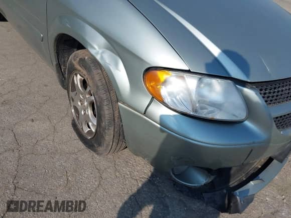 2004 Dodge Caravan SXT with VIN 2D4GP44L64R560481, listed as a IAAI auction lot 42798640 with 169,945 mi miles and . Bid and sale history available at DreamBid. Image 6.