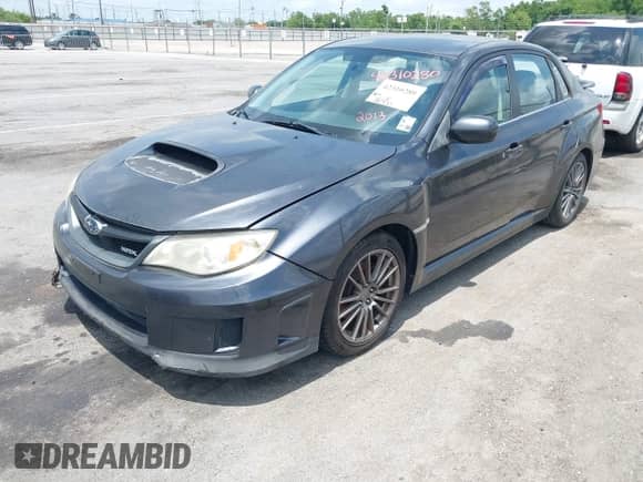 2013 Subaru WRX WRX with VIN JF1GV7E66DG021945, listed as a IAAI auction lot 42310280 with 226,980 mi miles and . Bid and sale history available at DreamBid. Image 2.
