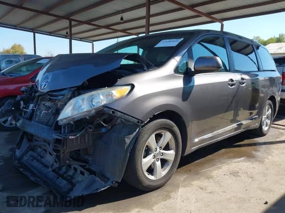 2014 Toyota Sienna LE AAS with VIN 5TDKK3DC3ES451291, listed as a IAAI auction lot 43486868 with 96,817 mi miles and . Bid and sale history available at DreamBid. Image 2.