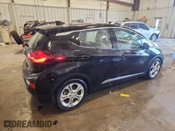 2019 Chevrolet Bolt EV LT с VIN 1G1FY6S0XK4135073, выставлен на аукционе Copart как лот 85540785 с пробегом 75 417 миль миль и Списание • Salvage title. История ставок и продаж доступна на DreamBid. Изображение 3.