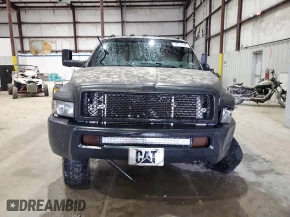 2002 Dodge 2500 с VIN 3B7KF23C22M299340, выставлен на аукционе Copart как лот 54511685 с пробегом 291 236 миль миль и Списание • Salvage title. История ставок и продаж доступна на DreamBid. Изображение 5.