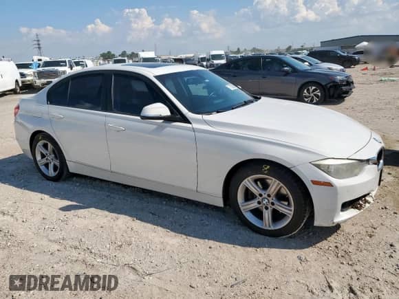 2015 BMW 3 Series 328i with VIN WBA3C1C5XFK123865, listed as a Copart auction lot 71325385 with 209,902 mi miles and Salvage title. Bid and sale history available at DreamBid. Image 4.