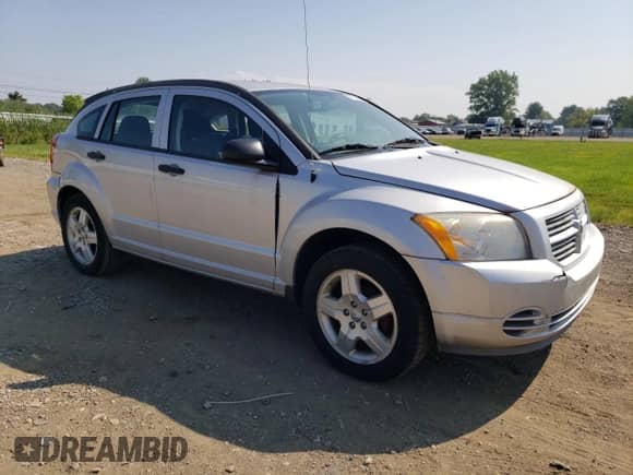 2011 Dodge Caliber z VIN 1B3CB1HA3BD296851, wystawiony jako Copart lot #68704655 z przebiegiem 113 601 mil mil oraz Czysty tytuł • Clean title. Historia ofert i sprzedaży dostępna na DreamBid. Obrazek 4.