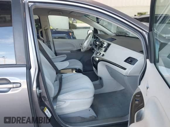 2012 Toyota Sienna LE AAS with VIN 5TDKK3DC6CS193748, listed as a IAAI auction lot 43190621 with 197,152 mi miles and . Bid and sale history available at DreamBid. Image 5.