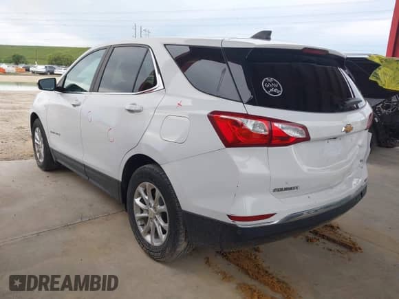 2021 Chevrolet Equinox LT with VIN 2GNAXJEV7M6158995, listed as a IAAI auction lot 43254877 with 84,928 mi miles and . Bid and sale history available at DreamBid. Image 3.