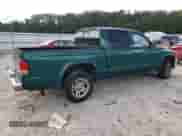 2003 Dodge Dakota SLT с VIN 1D7HL48N73S366294, выставлен на аукционе Copart как лот 71228564 с пробегом 281 401 миль миль и Списание • Salvage title. История ставок и продаж доступна на DreamBid. Изображение 3.