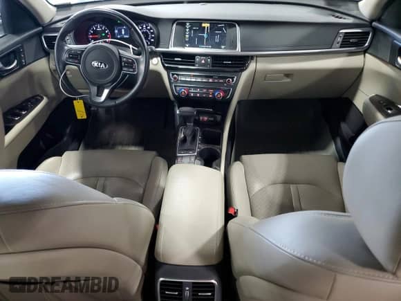 2016 Kia Optima EX with VIN 5XXGU4L36GG056307, listed as a Copart auction lot 63011895 with 69,738 mi miles and Salvage title. Bid and sale history available at DreamBid. Image 8.
