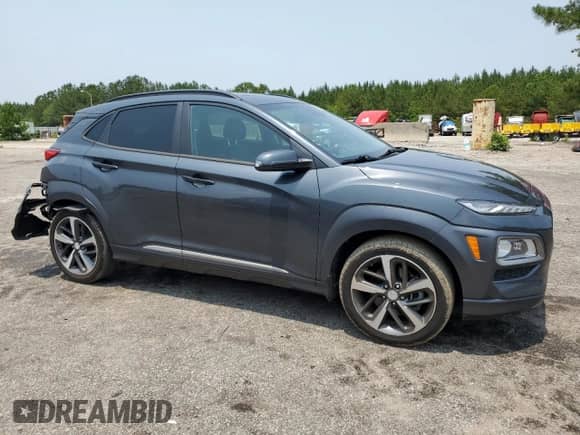 2021 Hyundai Kona Ultimate with VIN KM8K53A55MU606636, listed as a Copart auction lot 59309375 with 108,676 mi miles and Salvage title. Bid and sale history available at DreamBid. Image 4.