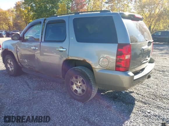 2009 Chevrolet Tahoe Commercial z VIN 1GNFK13049R150411, wystawiony jako IAAI lot #43417510 z przebiegiem 313 163 mil mil oraz . Historia ofert i sprzedaży dostępna na DreamBid. Obrazek 3.