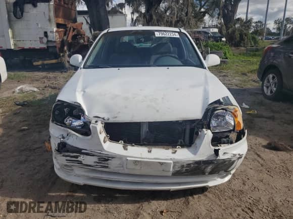 2004 Hyundai Accent GL с VIN KMHCG35C64U312248, выставлен на аукционе Copart как лот 79622234 с пробегом 107 594 миль миль и Списание • Salvage title. История ставок и продаж доступна на DreamBid. Изображение 5.