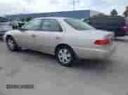 2001 Toyota Camry LE z VIN 4T1BG22K91U083996, wystawiony jako IAAI lot #43422068 z przebiegiem 256 386 mil mil oraz . Historia ofert i sprzedaży dostępna na DreamBid. Obrazek 3.