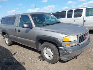 1999 GMC Sierra 1500 SL z VIN 1GTEC14V1XE550782, wystawiony jako IAAI lot #43190038 z przebiegiem Nie podano mil oraz . Historia ofert i sprzedaży dostępna na DreamBid. Obrazek 1.